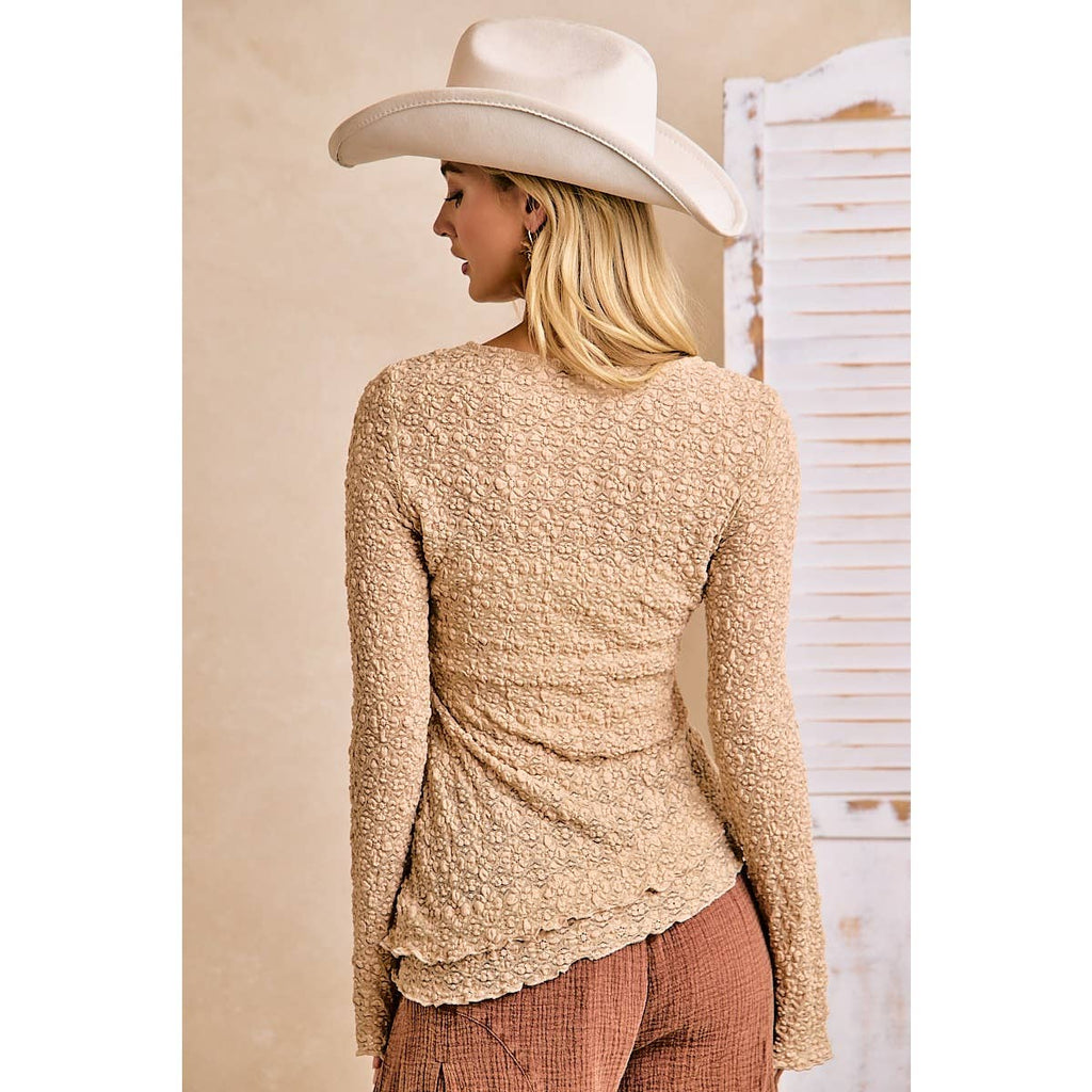 TEXTURED LACE KNIT DIAGONAL HEMLINE BELL SLEEVES TOP
